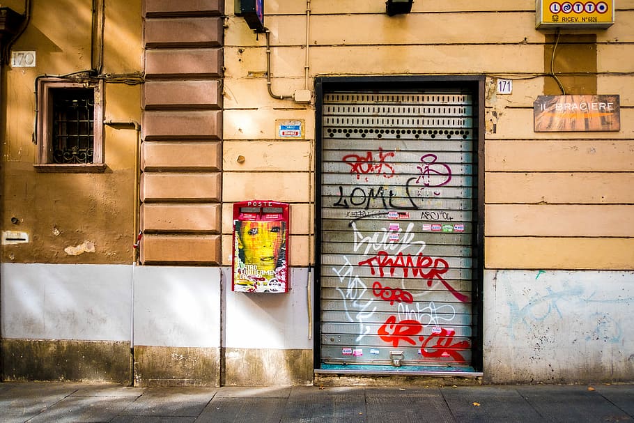 vandalized roller shutter door, closed gray roll-top gate, wall HD wallpaper