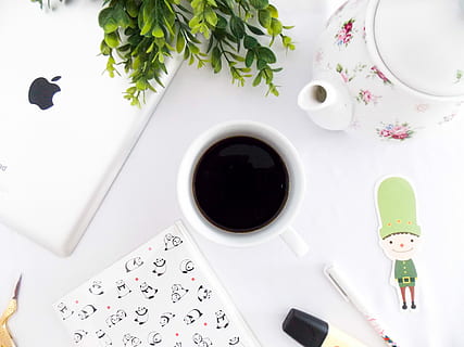 flat lay photography of coffee mug and ipad, mug near teapot and iPad HD wallpaper