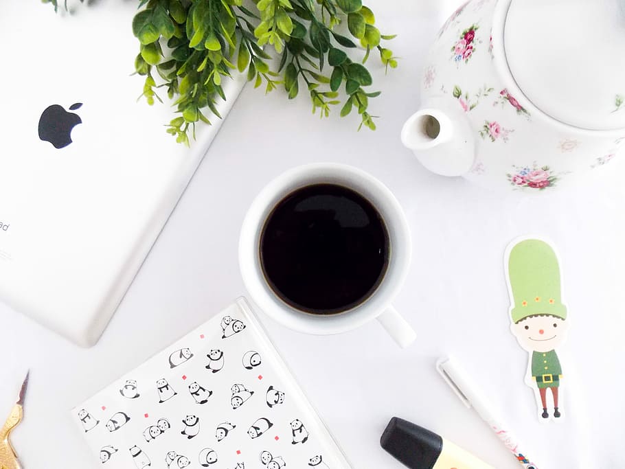 flat lay photography of coffee mug and ipad, mug near teapot and iPad HD wallpaper