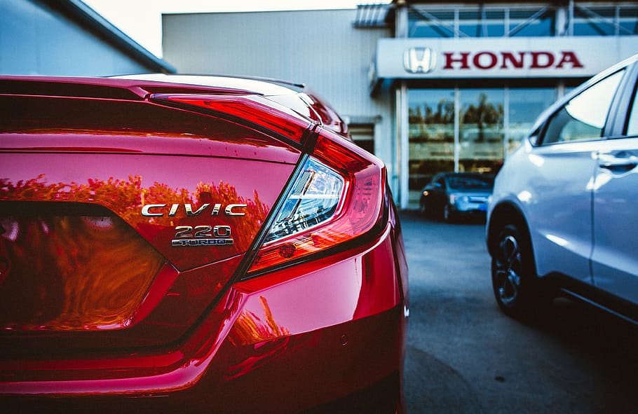 red Honda Civic taillight in close-up photo at daytime, car, vehicle