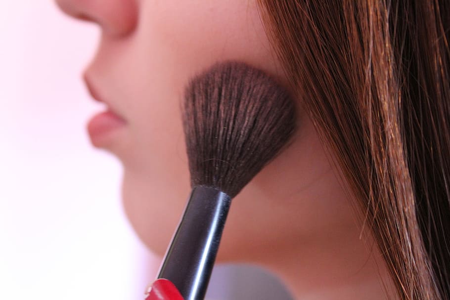 woman suing makeup brush on cheek, make up, make-up, cosmetics HD wallpaper