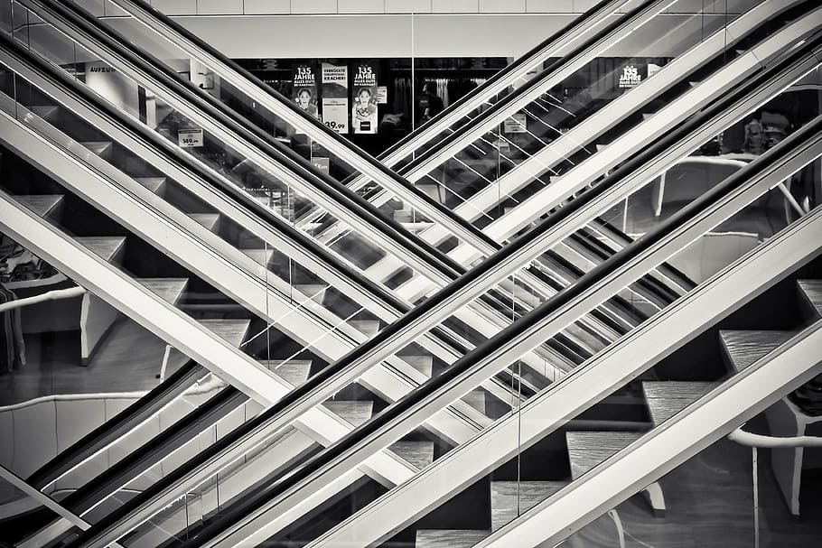gray scale photo of escalators, department store, building, architecture