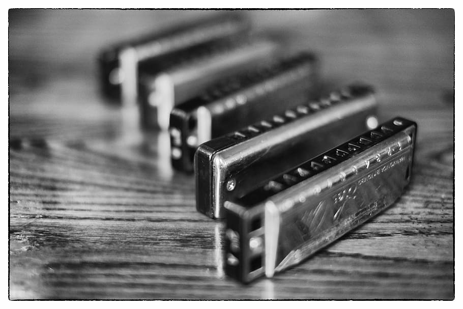 grayscale photography of harmonica, musical instrument, mouth organ
