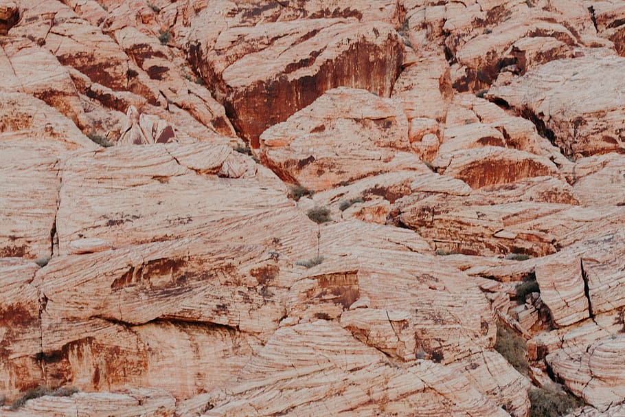closeup photo of brown cliff, aerial shot of rock formations HD wallpaper