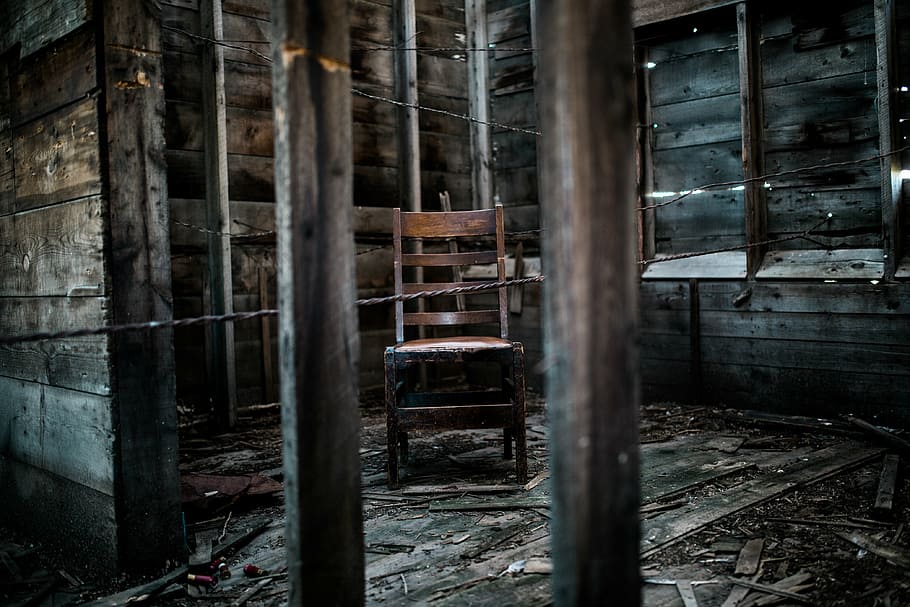empty wooden chair inside abandoned building room, landscape HD wallpaper