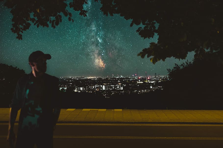 man walking on street with milky way galaxy view photo, man standing on road with milky way galaxy background, HD wallpaper