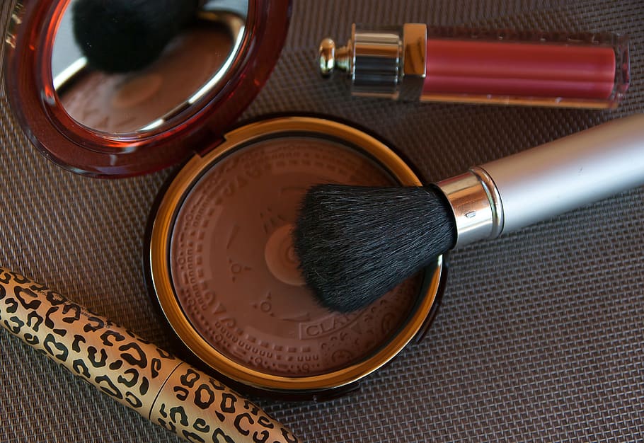 brown pressed powder and gray makeup brush on gray textile HD wallpaper