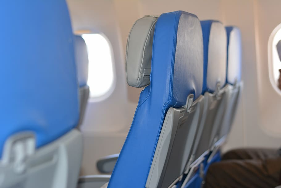selective focus photography of airplane seats, airline, chairs