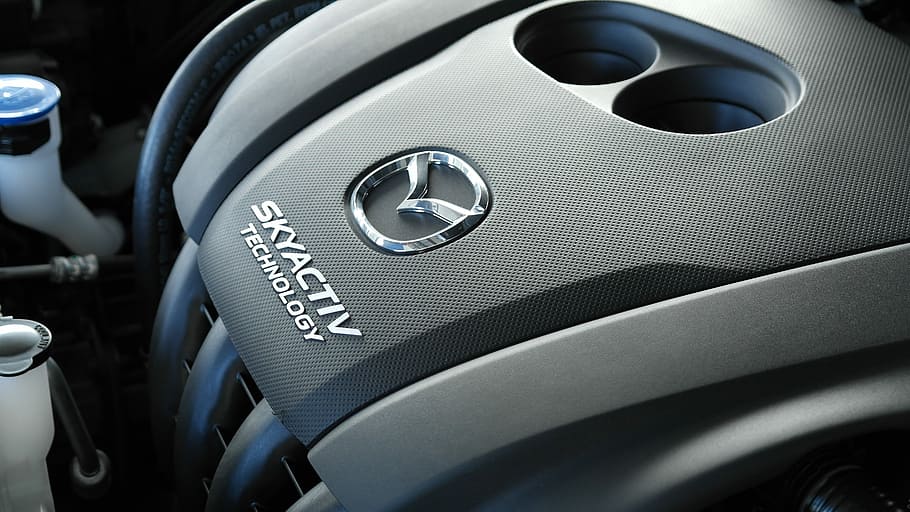 closed-up photo of gray Mazda Skyactiv Technology engine, auto HD wallpaper
