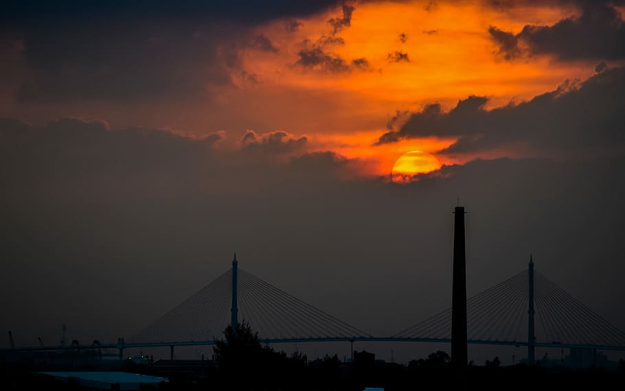 black bridge, silhouette of bridge during golden hour, clouds HD wallpaper