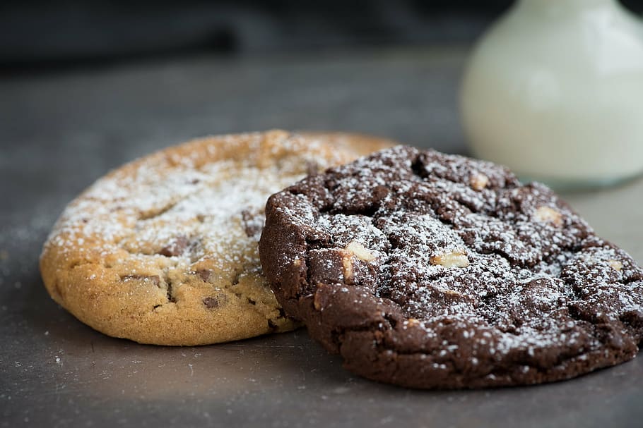 two cookies on gray surface, chocolate cookie, nut cookie, food HD wallpaper