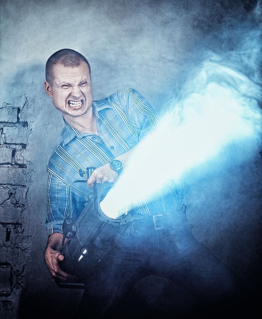man holding force air heater, wall, grin, teeth, person, portrait HD wallpaper