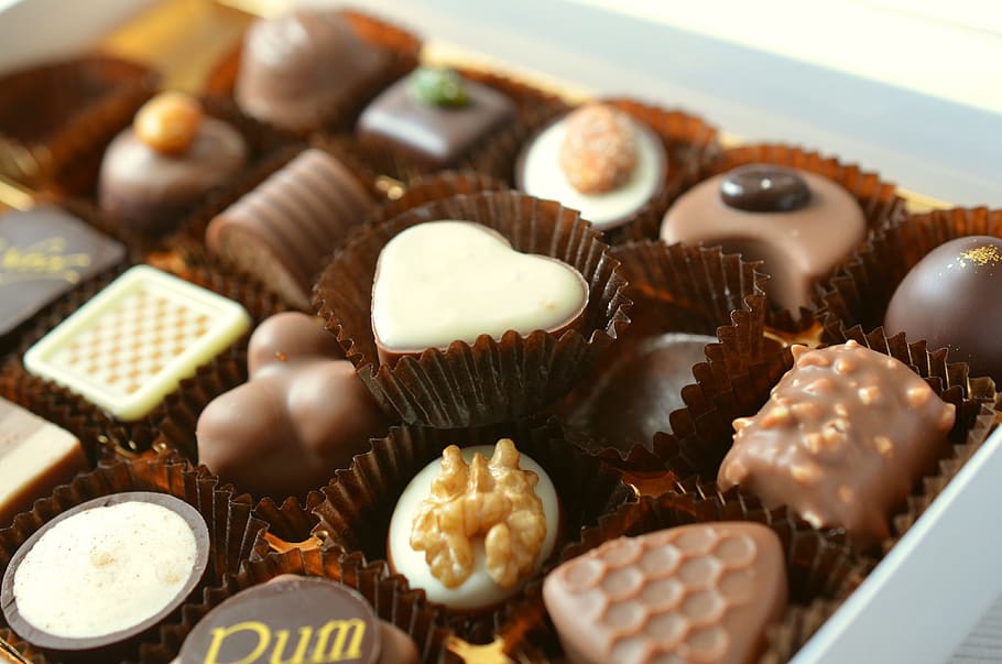 assorted-shape chocolate in box, heart-shaped, cupcakes, chocolates