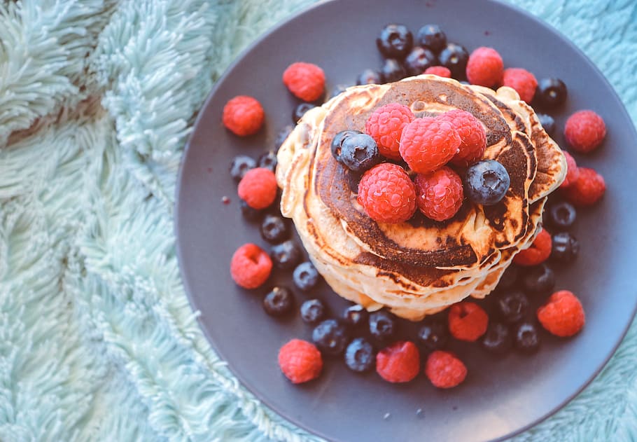 pancakes with blueberries and raspberries on gray plate, pancake with raspberry and berry on top HD wallpaper