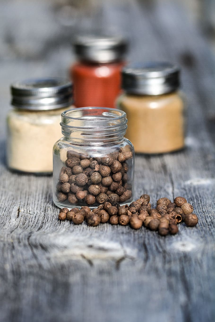 brown nuts in clear glass jar, spices, kitchen, cooking, wooden HD wallpaper