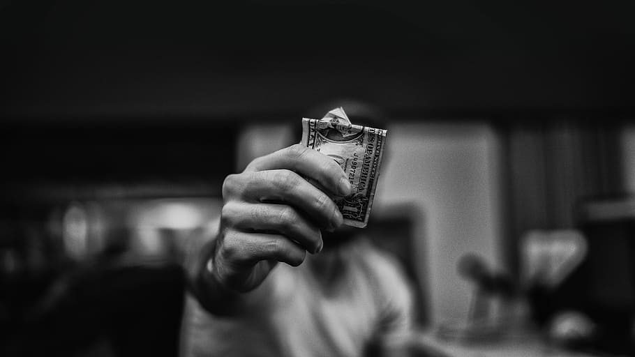 man holding 1 US dollar banknote, person holding 1 US dollar banknote in grayscale photography HD wallpaper
