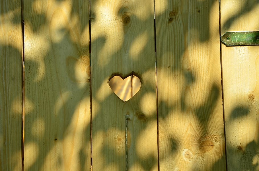 heart shape ornament on wooden floor, door, toilet, wc, cottage