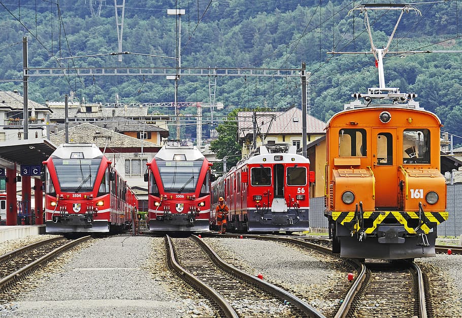 red and orange trains, tirano, swiss mountain, italy, bernina railway