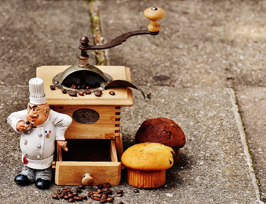 figurine chef standing beside oven miniature, grinder, muffin HD wallpaper