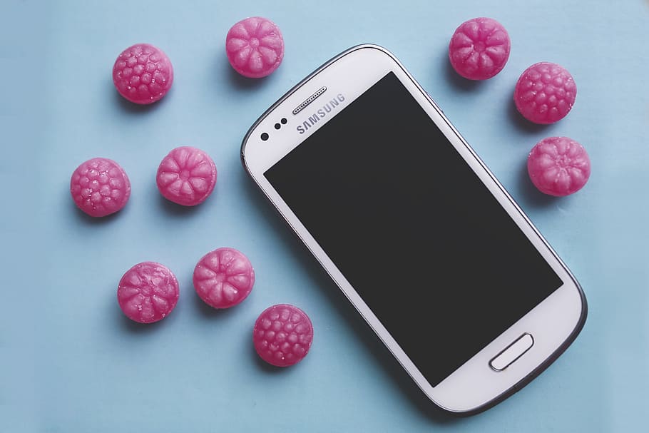 white Samsung Galaxy SIII mini, pink, candy, sugar, smartphone HD wallpaper