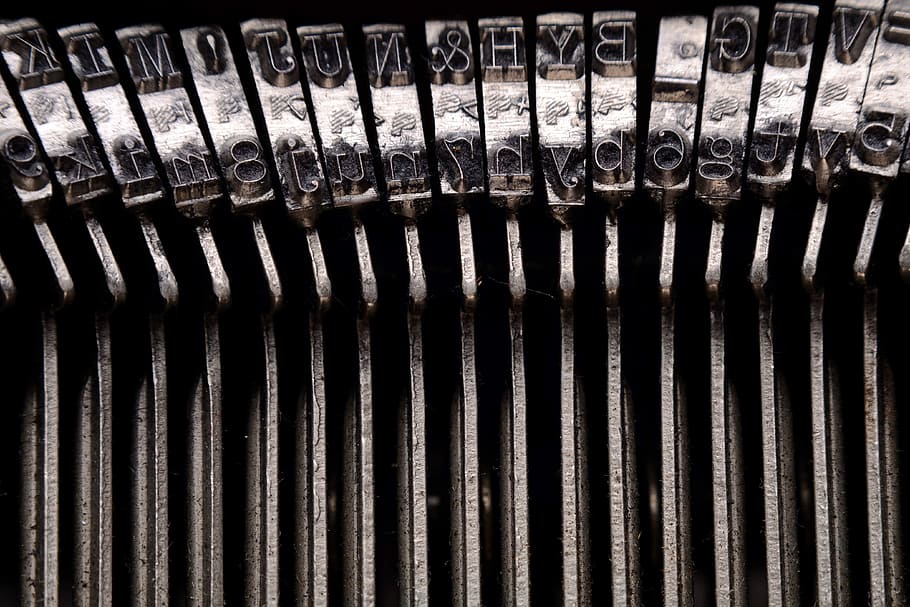 focus photography of silver typewriter pins, gray typewriter keys HD wallpaper