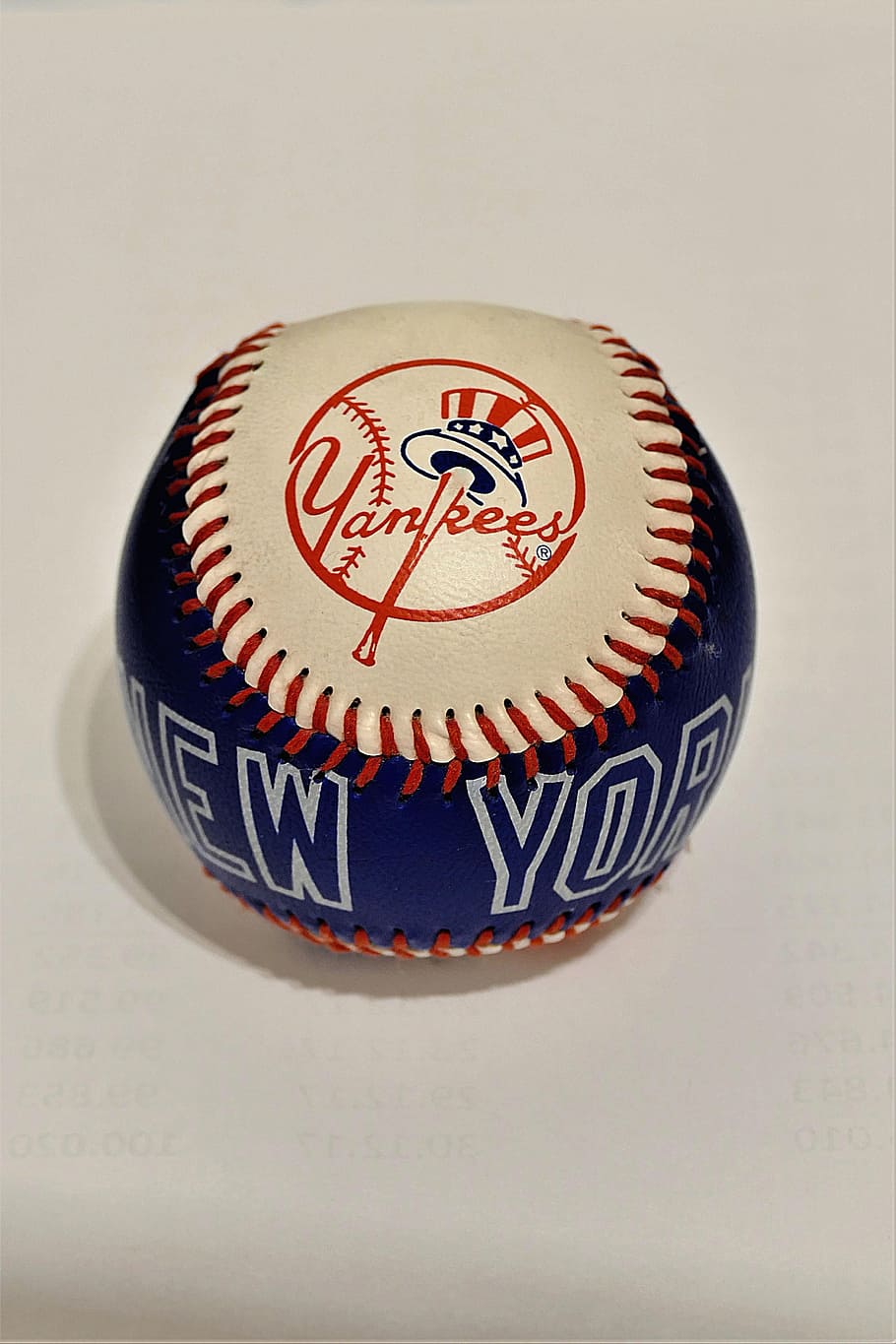 blue and white New York Yankees baseball, souvenir, leather, sport