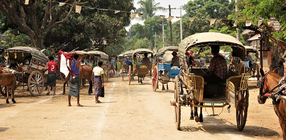 people riding horse carriages, myanmar, temple visit, travel