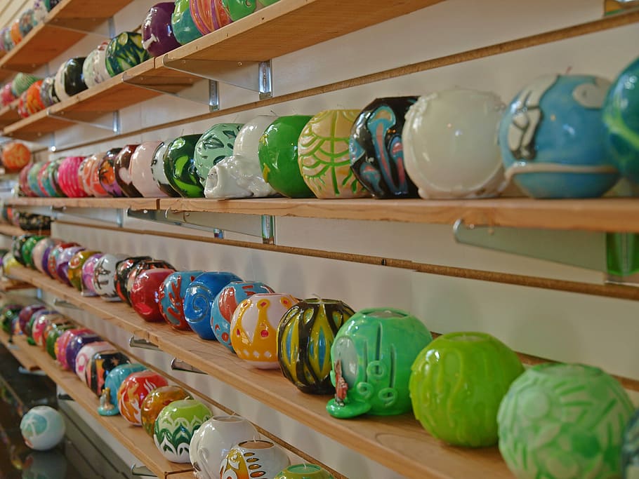 assorted-color plastic toy lot on shelves, market, stock, shelf