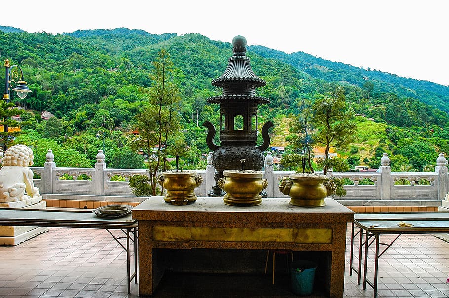 three brass-colored containers on brown table, sacrificial table HD wallpaper