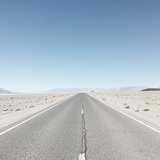 empty highway during daytime, gray concrete road between desert HD wallpaper