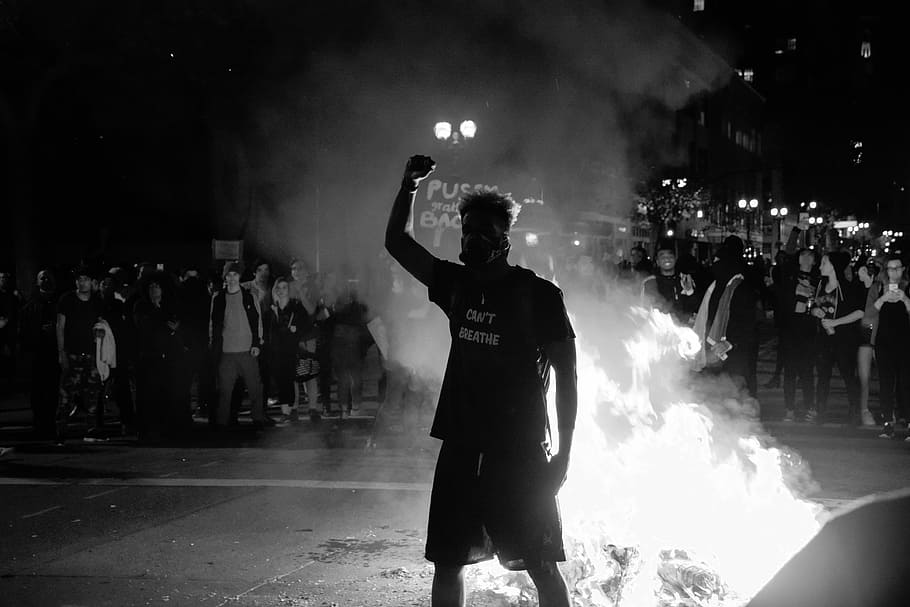 Resistance, greyscale photo of man wearing gas mask standing near bonfire HD wallpaper