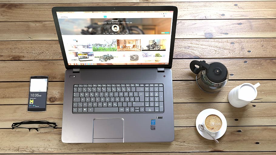turned on laptop computer beside coffee and turned on smartphone HD wallpaper