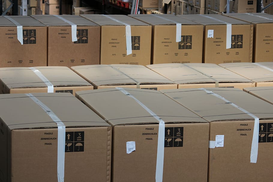 close up photo of cardboard boxes, warehouse, pallets, stock