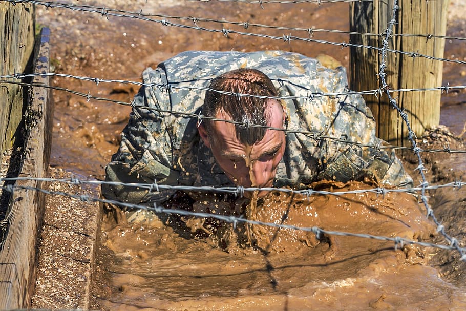 man crawling on mud under the barbwire, challenge, soldier, military