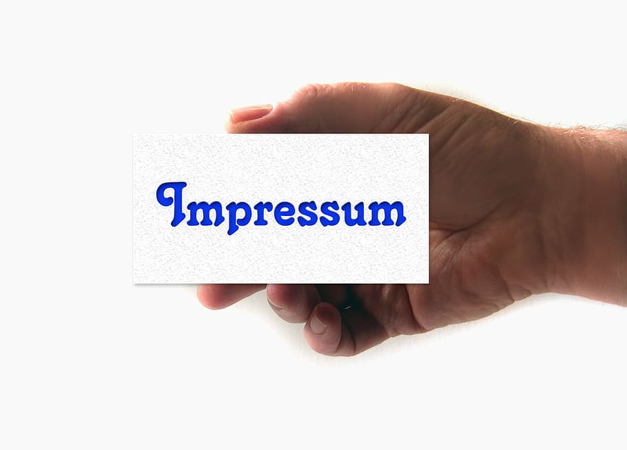 person holding Impressum-printed card, imprint, about us, map, HD wallpaper