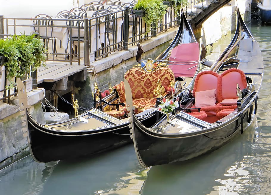 two brown wooden boats with fabric sofas on body of water, italy HD wallpaper