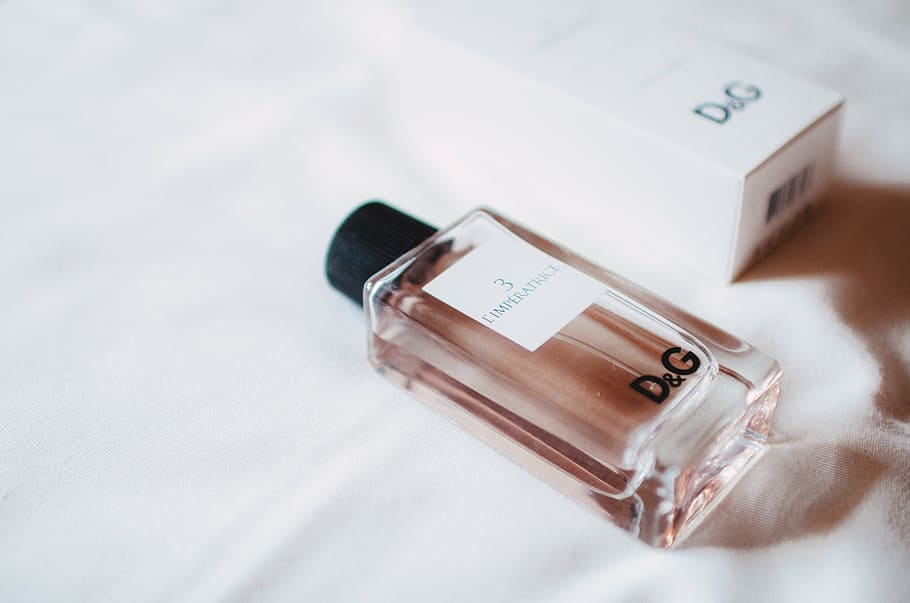 sealed Dolce & Gabanna fragrance bottle above white textile, luxury, HD wallpaper