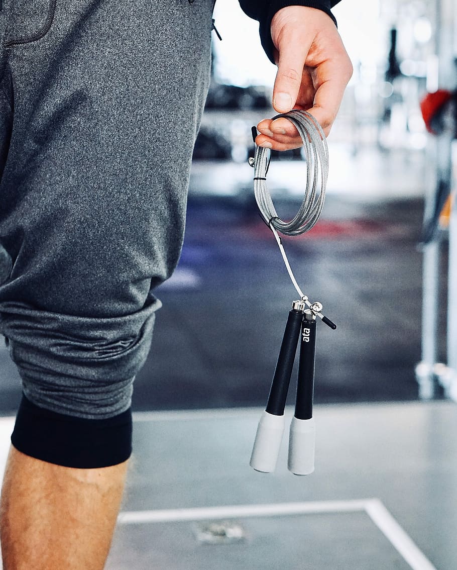 person holding gray wire, hand, skip, gym, workout, real people HD wallpaper
