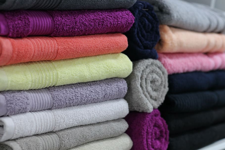 assorted-color towel lot, towels, linens, store, bath linen, white