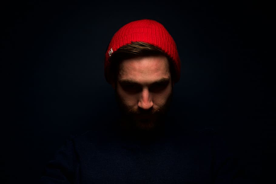 man wearing red cap, people, guy, face, beanie, dark, men, beard, HD wallpaper