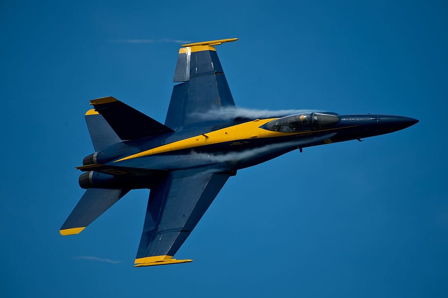 timelapse photo of a blue and yellow jet fighter, blue angels HD wallpaper