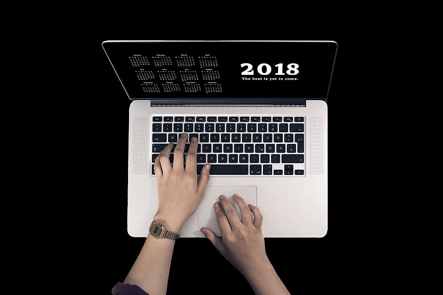 person touching MacBook Pro, laptop, keyboard, hands, year HD wallpaper
