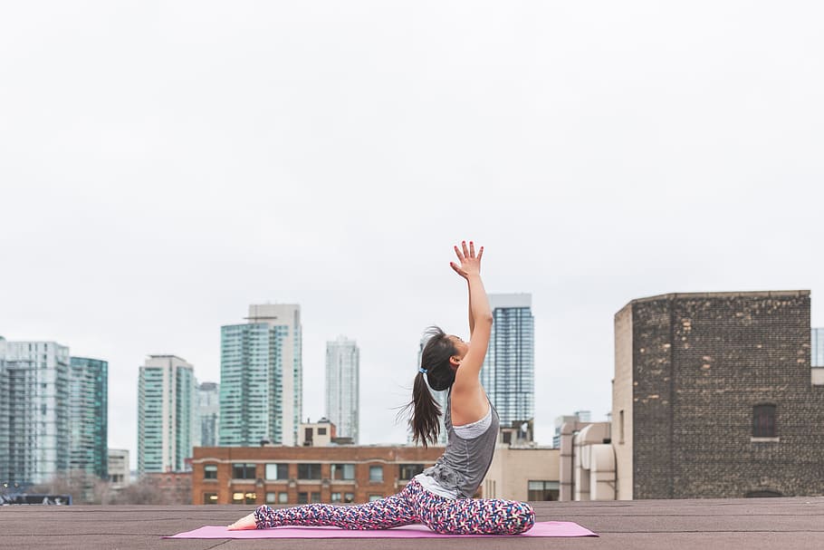 woman on pink yoga rug doing yoga, architecture, building, infrastructure HD wallpaper