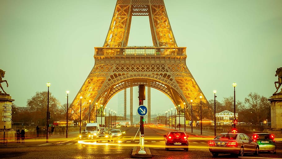 Eiffel tower surround with vehicle traveling, long exposure HD wallpaper