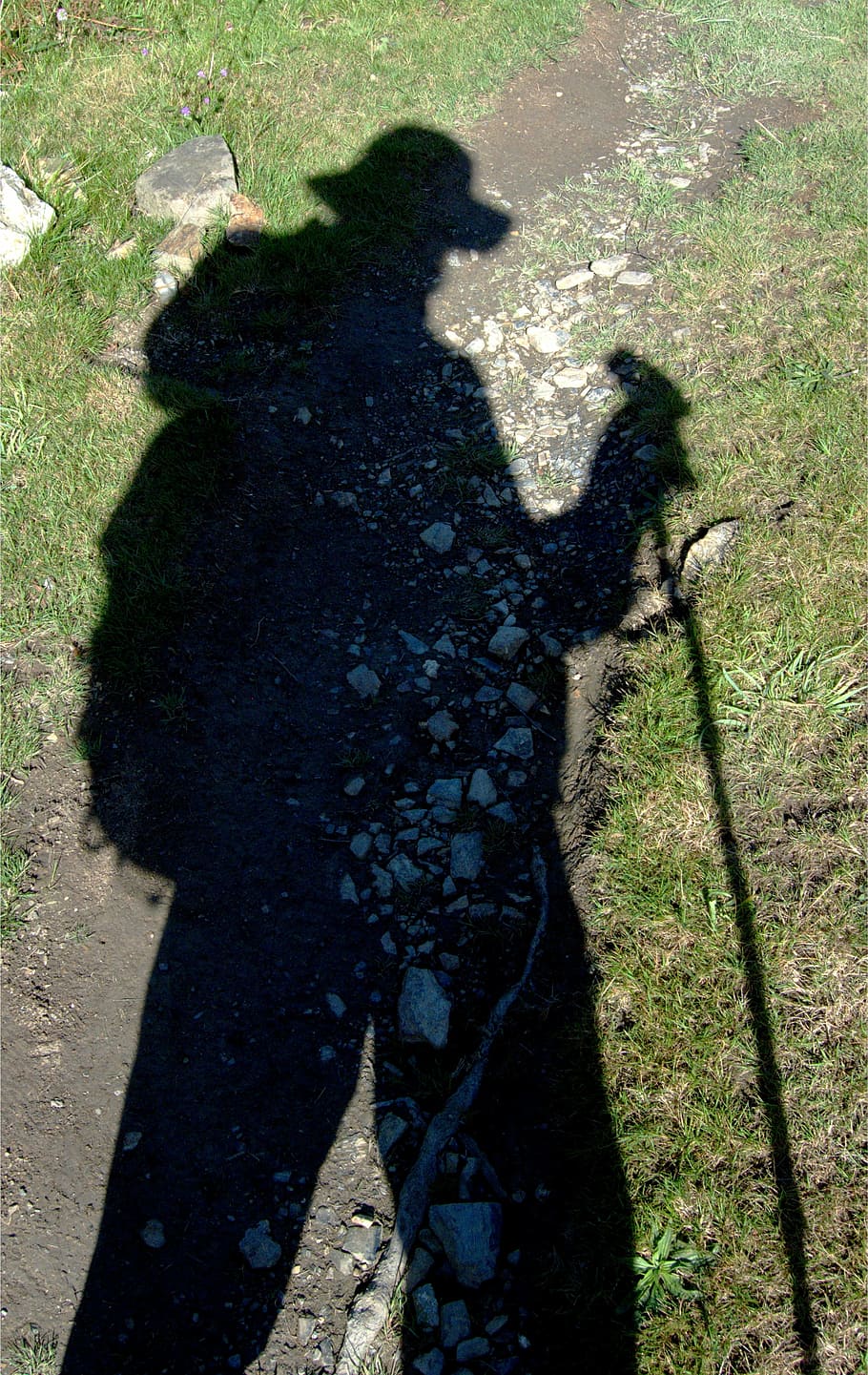 photo of person's shadow, trek, trekker, walker, traveler, adventure