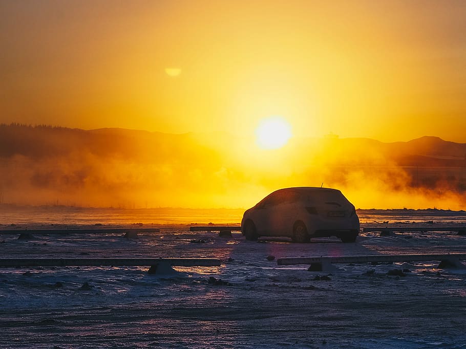 silhouette of hatchback on open field during sunset, white vehicle in an open field at golden hour HD wallpaper