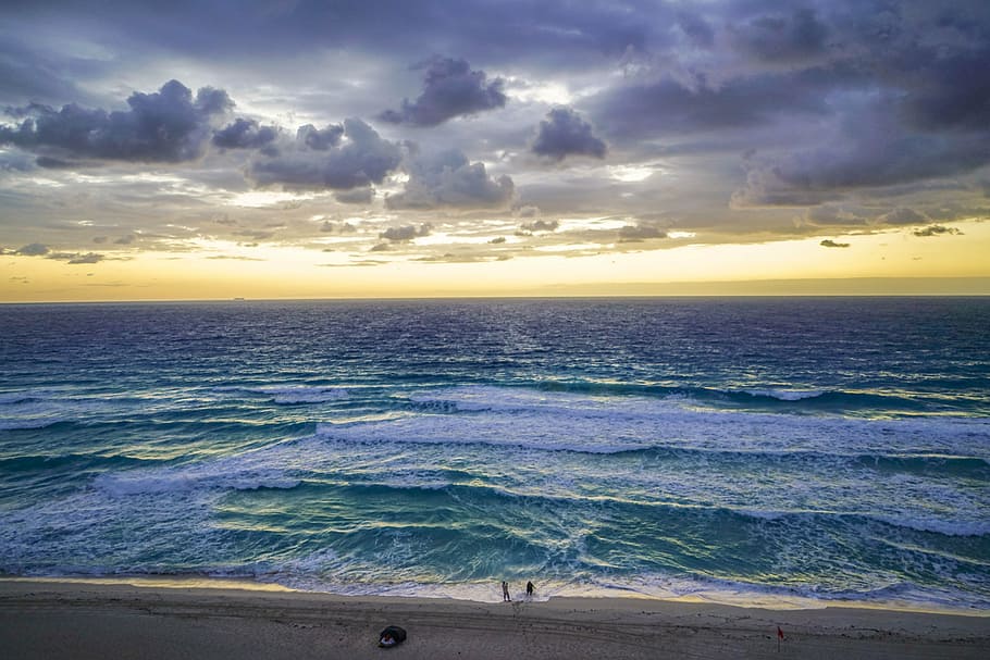 photo of body of water under white clouds at daytime, cancun HD wallpaper