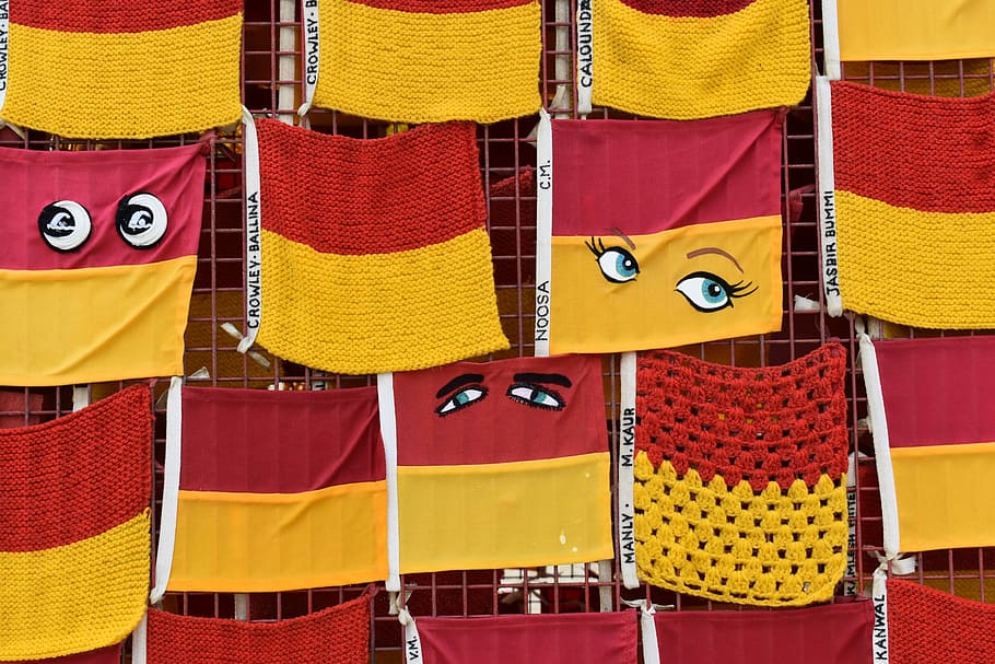hanging red-and-yellow textile, red and yellow textiles, flag HD wallpaper