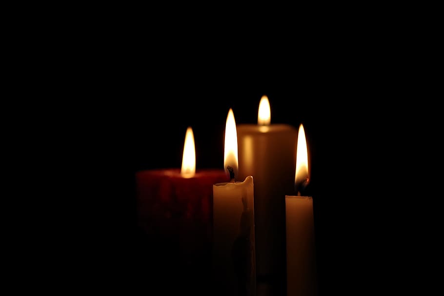 four lighted candles, all souls ' day, memory, the tomb of, all saints ' day