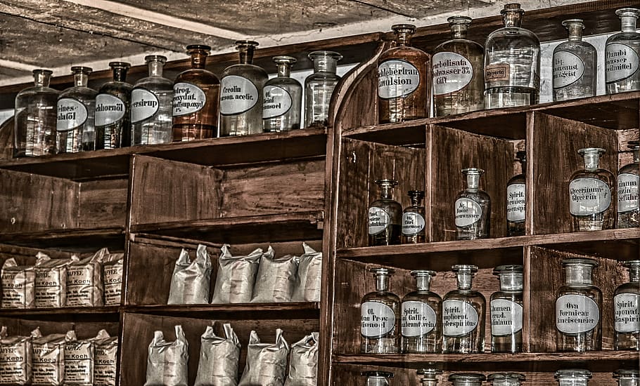 bottle and sachet lot on shelf, pharmacy, antique, old, chemicals
